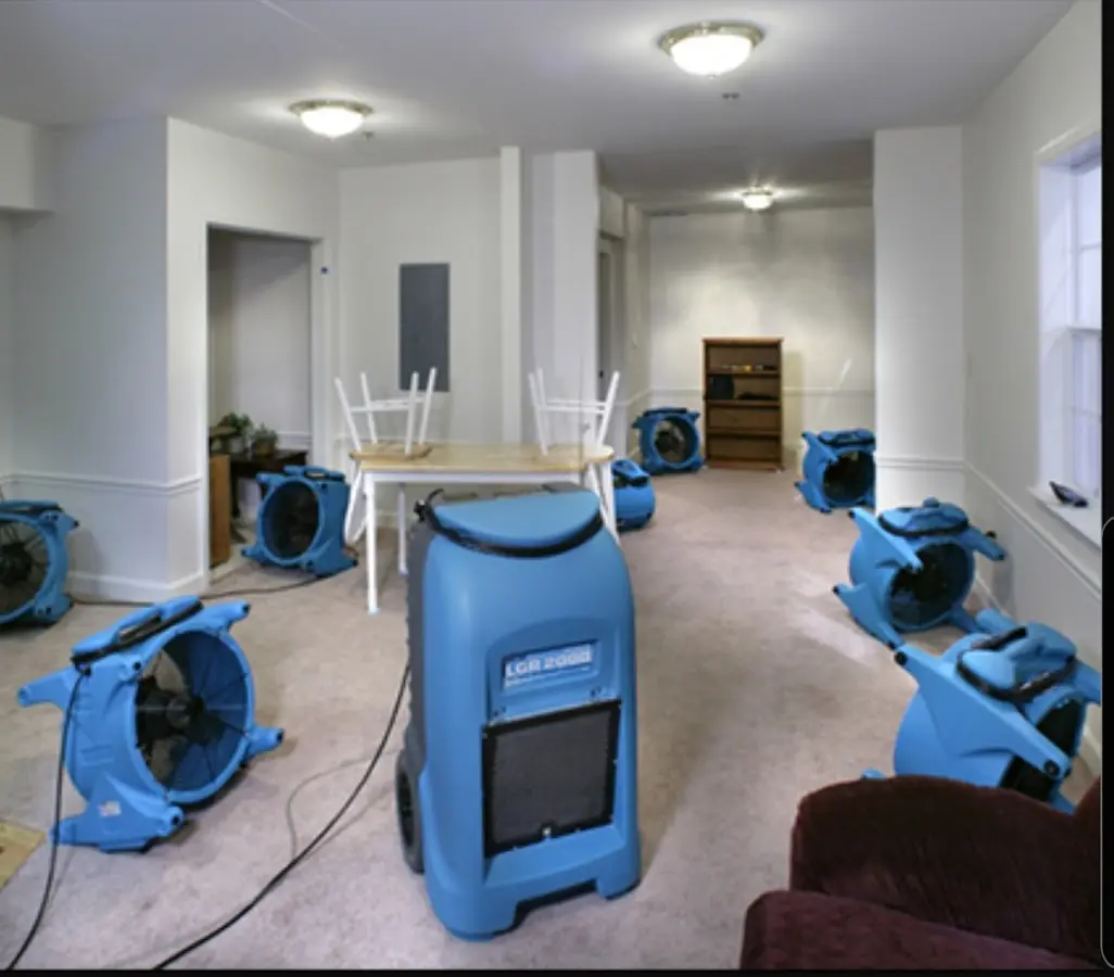 Air movers and dehumidifier setup for Water Damage Restoration in New Albany